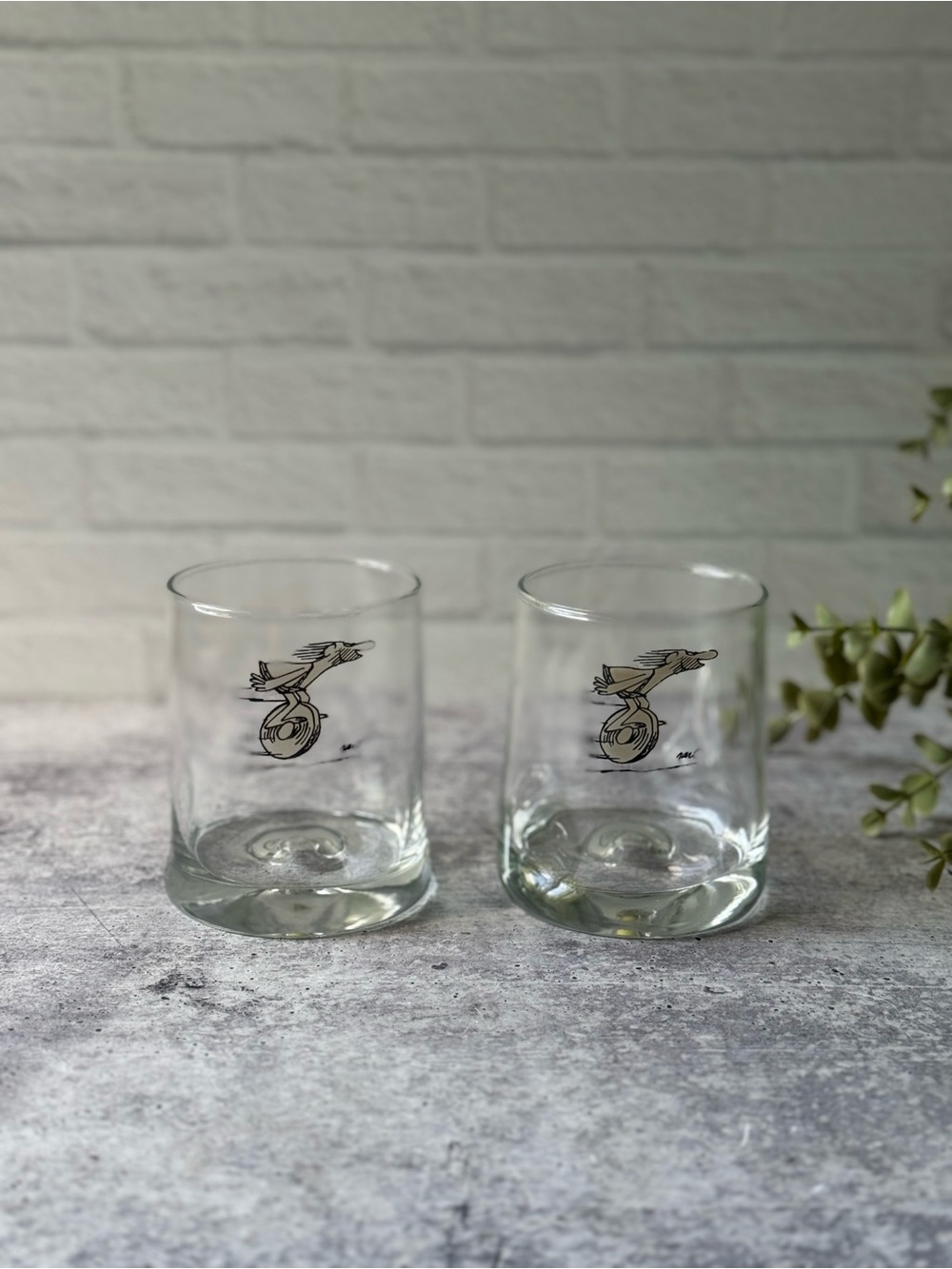 2 Vintage BC Comic Caveman on Wheel Dimpled Tumbler Glasses by Johnny Hart 70s
